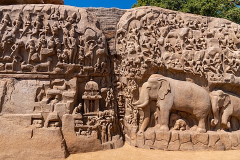 Arjuna’s Penance is an open-air rock relief is carved on two boulders of pink granite